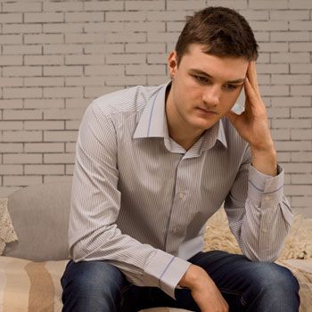 Young male suffering from depression